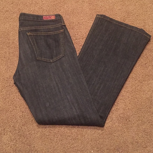 AG "The Angel" boot cut jeans dark wash.