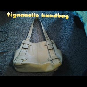 Tan hand bag