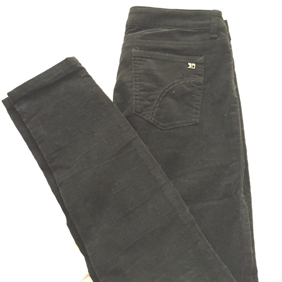 Black corduroy skinny jeans.