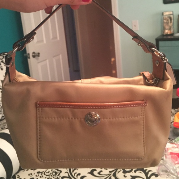 Gold Coach Handbag