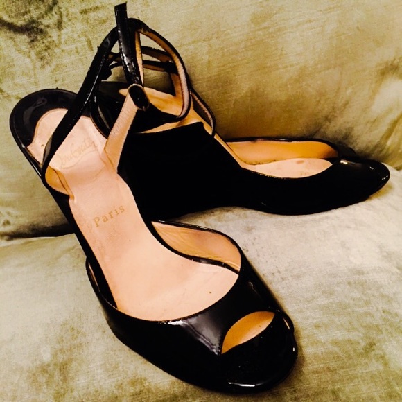Christian Louboutin black patent peep toe wedges!