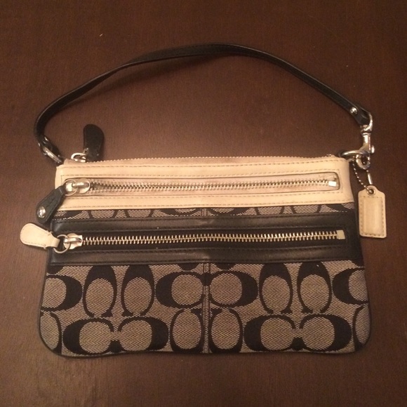 Coach triple compartment wristlet
