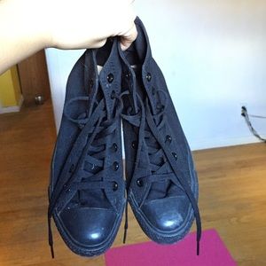 Woman's barely worn, black high top converse