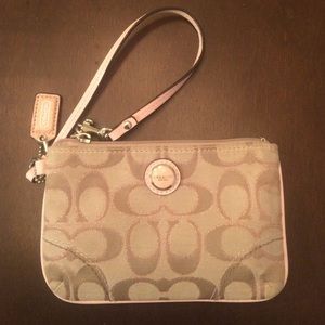 PInk and tan coach wristlet