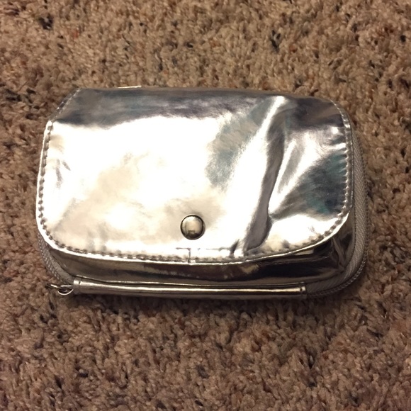 Metallic wristlet.