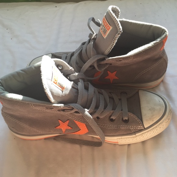 Grey and orange high top converse all stars