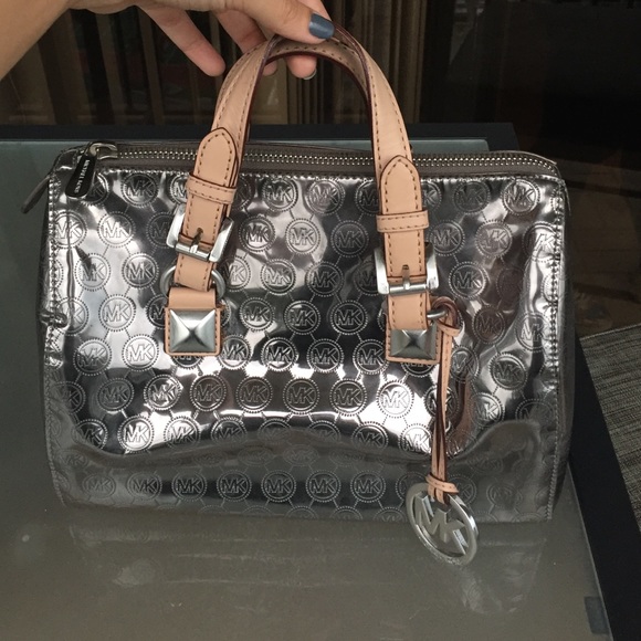 Michael Kors silver bag. Perfect condition.