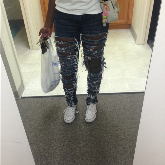 Distressed dark wash jeans