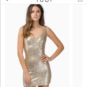 Gold colored Tobi  got your back bodycon dress