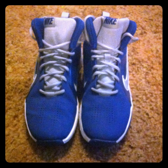 Nike blue, gray, and white basketball shoes.