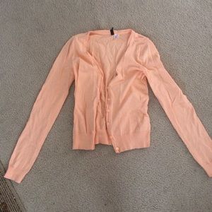 light peach cardigan