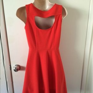 Orange like new dress with unique sexy back. NWOT