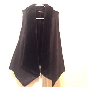 Classy black vested cover lined with faux fur!