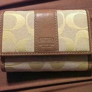 Canary yellow Coach wallet