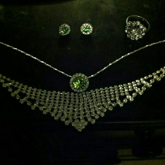 2 neckesses, earrings, and ring