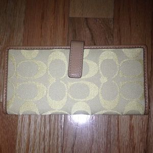 Canary yellow Coach credit card wallet