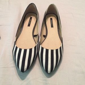 Black and white striped flats
