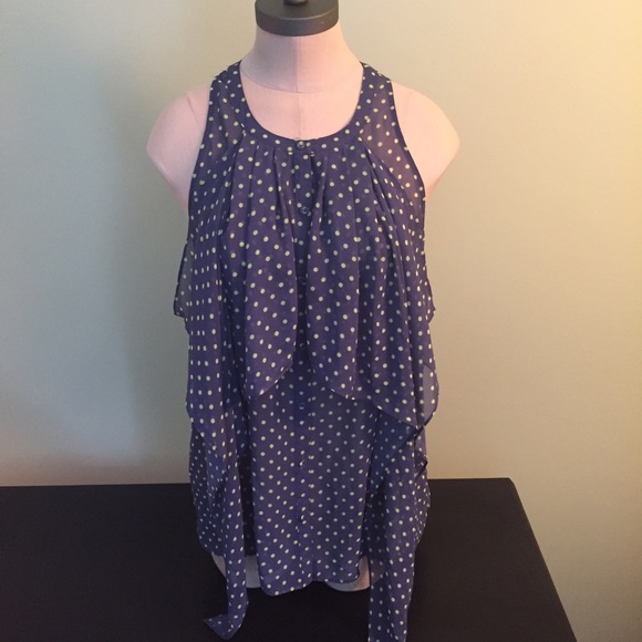 Sleeveless Polka dot top and ruffle detail