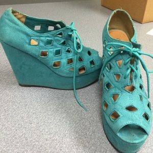 Teal cut out wedges