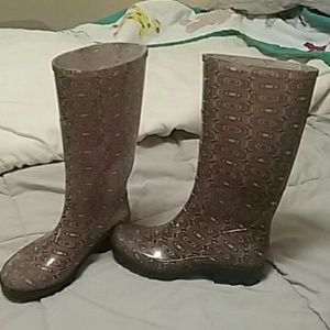 Purple and pink rain boots