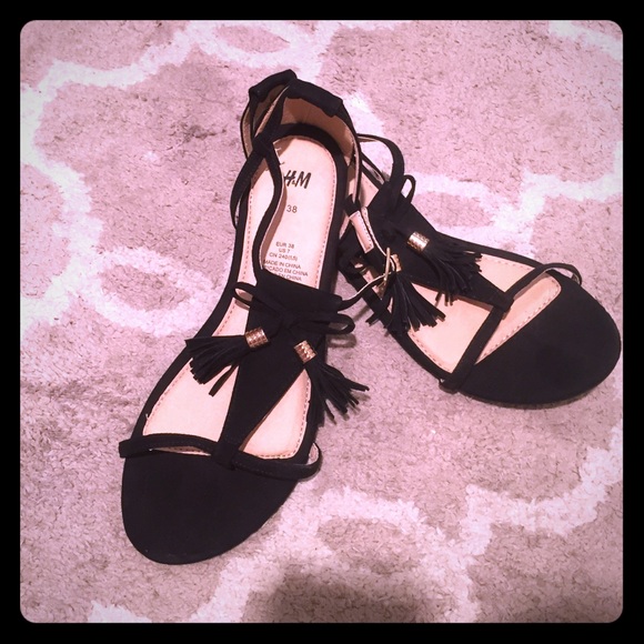 Black fringe sandals