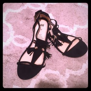 Black fringe sandals