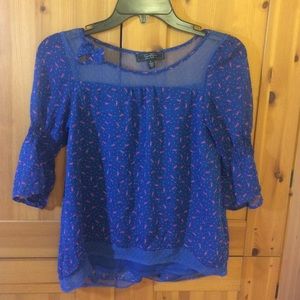 Elegant navy blue shirt with mesh detailing.