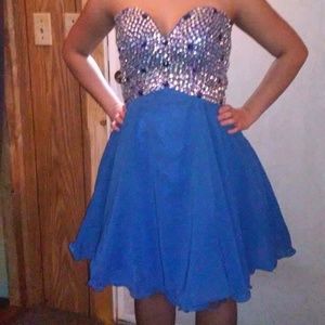 Beautiful corset back homecoming dress.