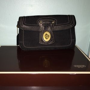 Black coach wristlet.