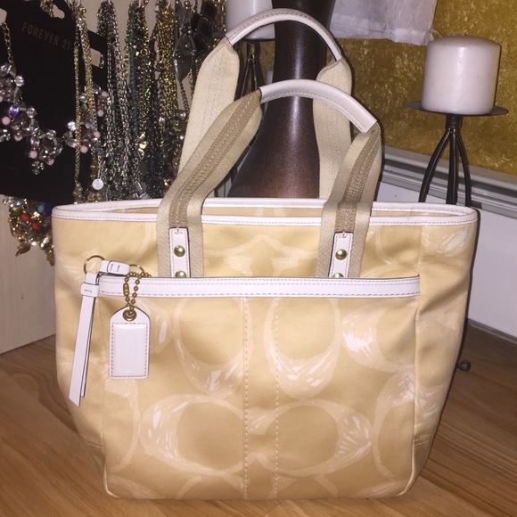 Beige, tan and white COACH signature fabric bag