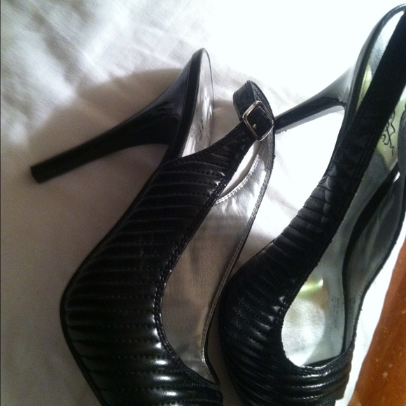 Black sling backs sold