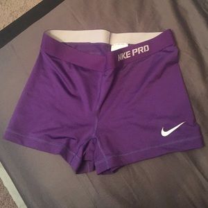 Purple Nike pros
