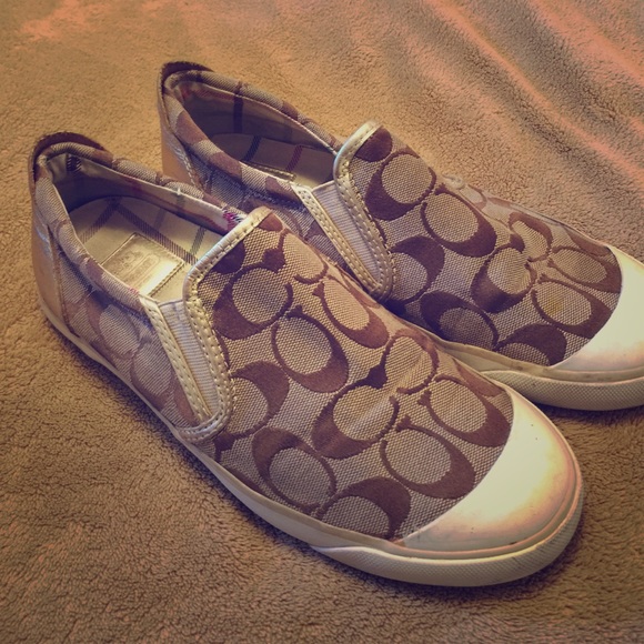 Brown coach slip ons