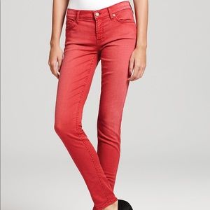 Distressed/faded style red skinny jeans