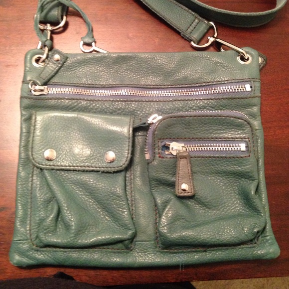 Fossil - leather cross body.  Teal leather.