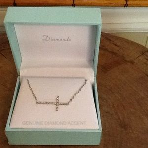 Diamond accent sideways sterling silver cross neck
