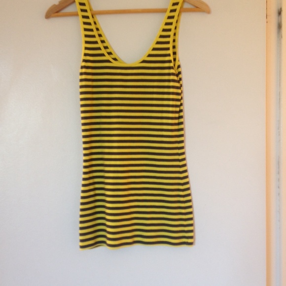Small striped yellow dark blue top.