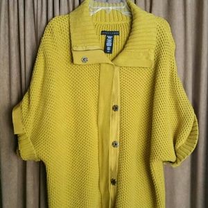 Short sleeved mustard colored knit sweater.