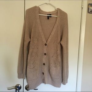 Long beige sweater vest