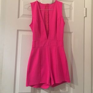Hot Pink Deep plunge Romper! NEW! never worn