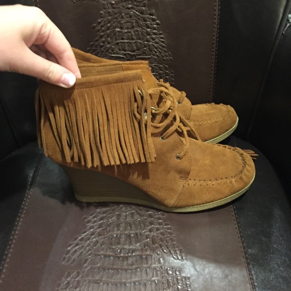 Minnetonka fringe lace up booties!!  New!!
