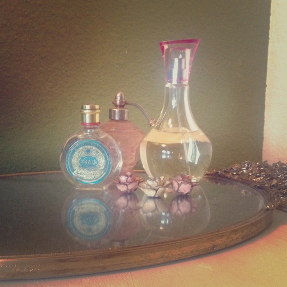 3/4 full Paris Hilton perfume