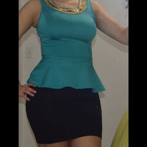 Small Turquoise peplum top.