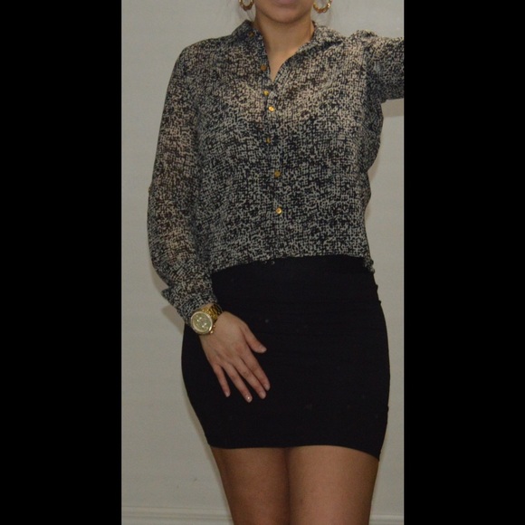 Small black and white pattern blouse.