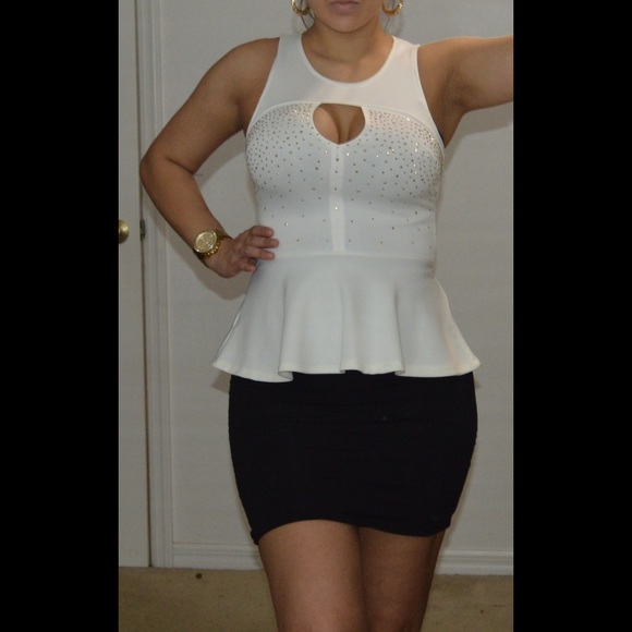 Small White & gold peplum top.