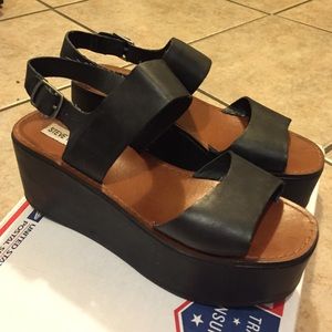 Black leather Steve madden platforms