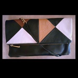 Fold over flap clutch with optional strap