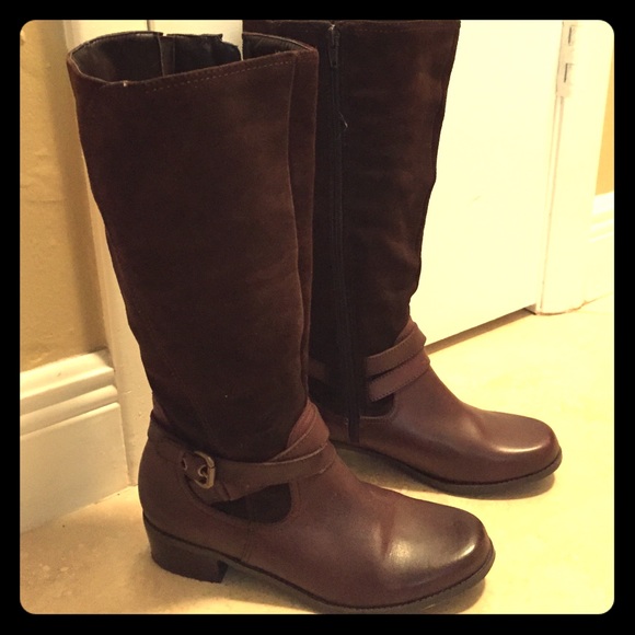 Brown leather boots size 8.5. Never worn.