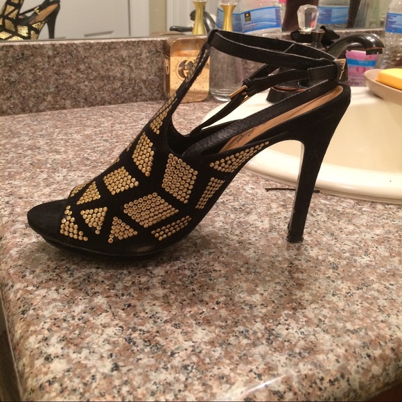 Gold and black shoes