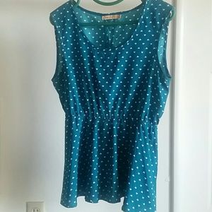 Turquoise top w/ white hearts and cutout on back